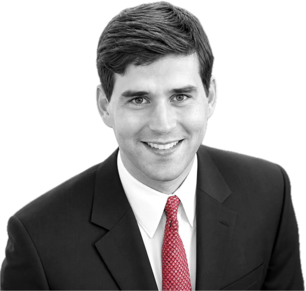 Brian Mueller in a dark suit and red tie
